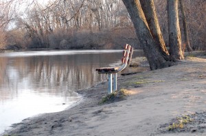 You could still sit on this bench in Fox River Park and not get your feet wet, Wednesday evening.
