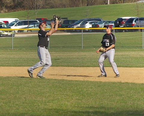 imgp8343 Central's Johnny Wilson catches the popup, with Tim Clark backing up the play. Dave Thoss photo