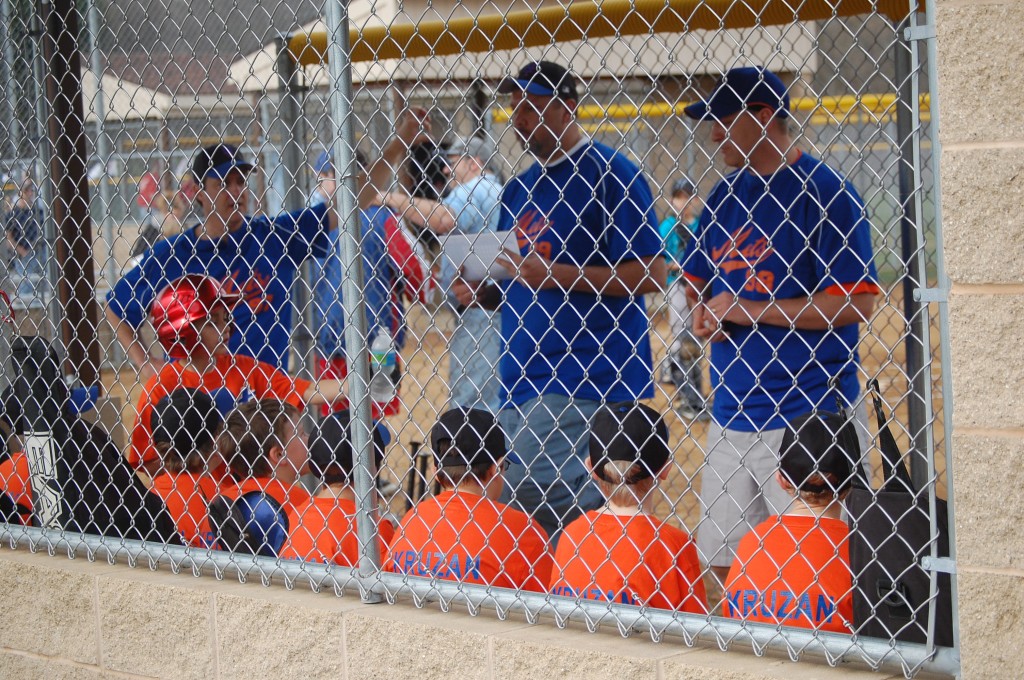 The Mets get some last minute instructions from the coaches about everything from how the starting pitcher for the other team looks to drinking enough water.