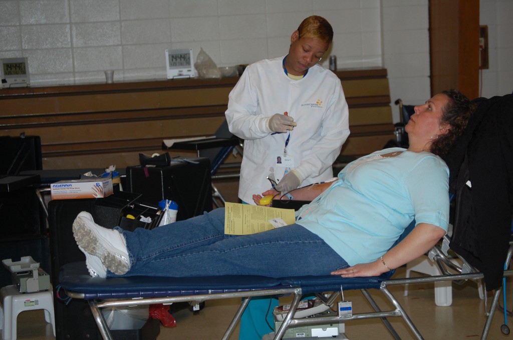 Sandra Swanson lays back and relaxes while giving blood at Salem School Friday. The drive collected 23 units of blood.