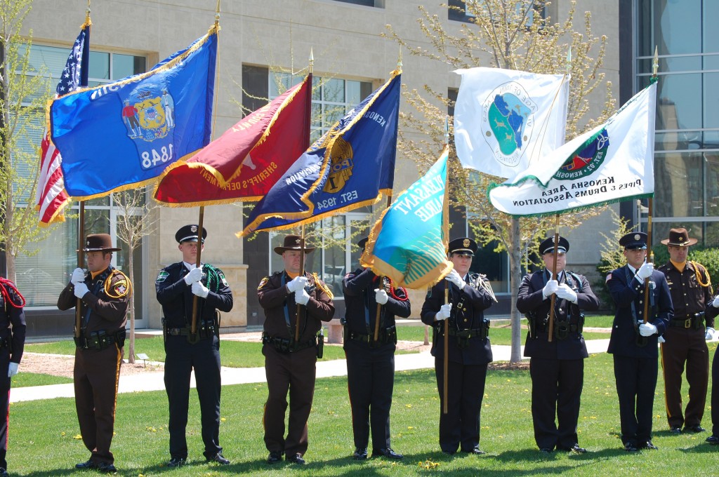 police-memorial-colors The color guard, made of officers from the Kenosha, Pleasant Prairie, UW-Parkside, Twin Lakes police departments and the Sheriff's Department retire the colors. retires the
