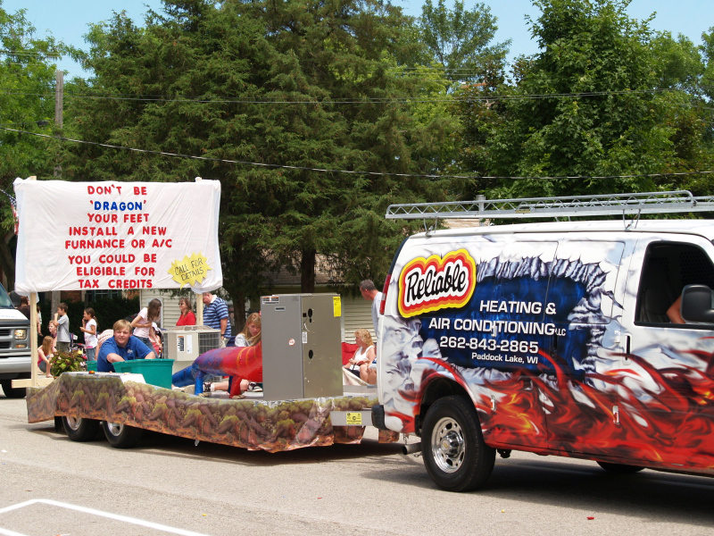 Reliable Heat and Air Conditioning had several of the company's vehicles in the parade plus a float.