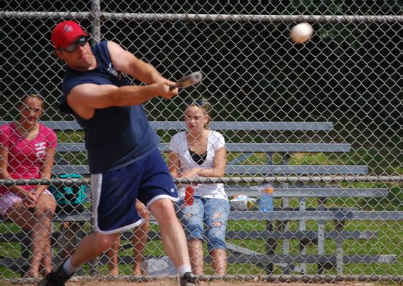 Assistant Fire Chief Al Stolp at bat. /Andrew Strother photo