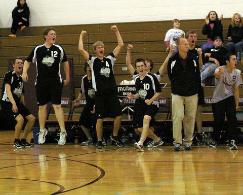 The Central bench erupts as the final point is scored .