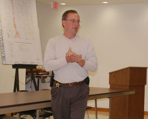 Sheriff David Beth addresses Paris residents Monday at Town Hall. The meeting was regarding what some residents saw as an alarming increase in burglaries of late in the town.