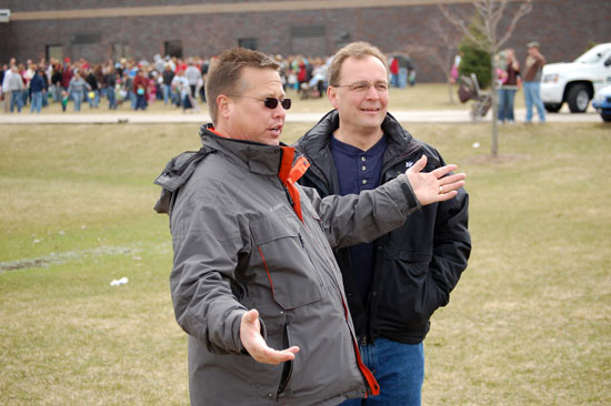 Tom Paddock, left, talks with Sheriff David Beth at the 2009 Westosha Kiwanis Easter Egg Hunt, just one of many Kiwanis community service projects he was instrumental in organizing.