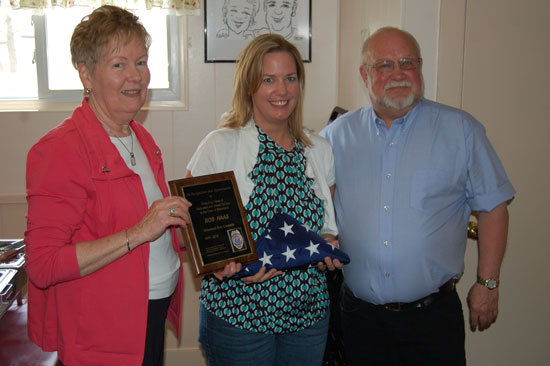 Former Wheatland Constable Bob Haas (right) receives recognition of his 34 years as constable from Wheatland town Clerk Sheila Siegler and state Rep. Samantha Kerkman.