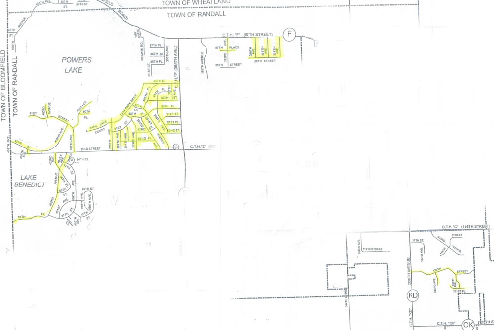 This two areas of Randall map (not contiguous) show in yellow highlight where the town will have crack sealing done. (Click for larger view)