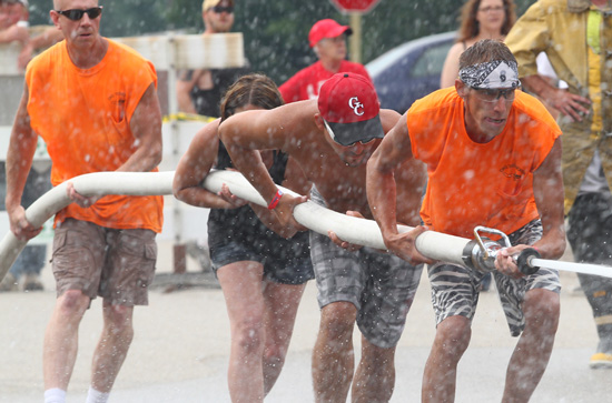 One of the teams in the water fights with teams from local businesses. /Earlene Frederick photo
