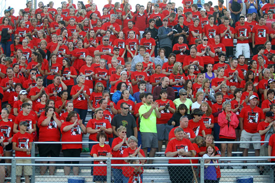 The crowd gives a standing ovation after Scott Walter's remarks. /Earlene Frederick photo