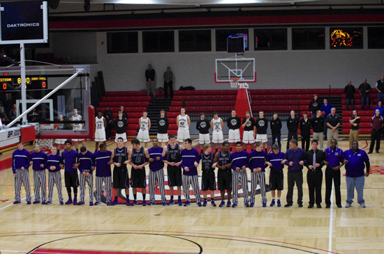 Central and Indian Trail line up for National Anthem. /David Thoss photo