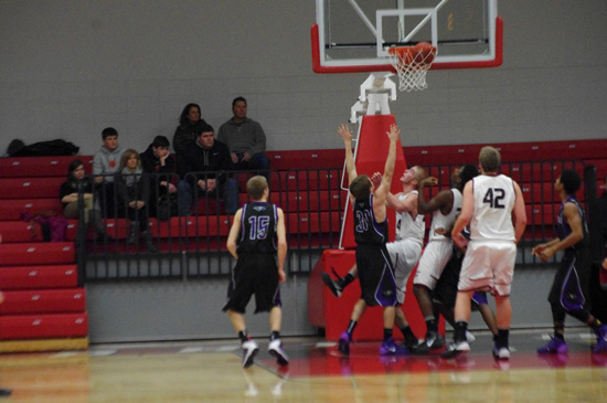 Karsten watches his made layup. /David Thoss photo