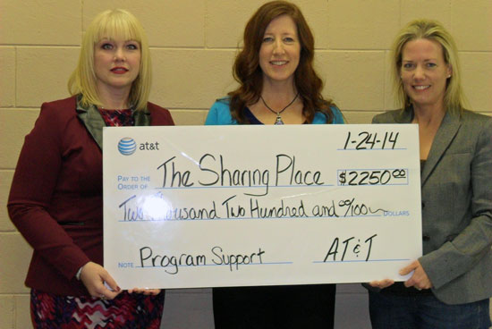 AT&T Wisconsin provided a $2,250 donation to support The Sharing Center’s food pantry. Pictured (L-R) Tricia Conway of AT&T Wisconsin, Sharon Pomaville of The Sharing Center and State Rep. Samantha Kerkman. /Contributed photo