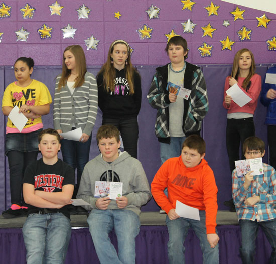 The sixth grade students that received awards included: (top) Isabelle Keen, Hannah Moat, Frank Bain, Kenna Beth, (bottom) Adam Seybert, Charlie Feeney, DJ Seward, and Caden Ryshkus. /Submitted photo