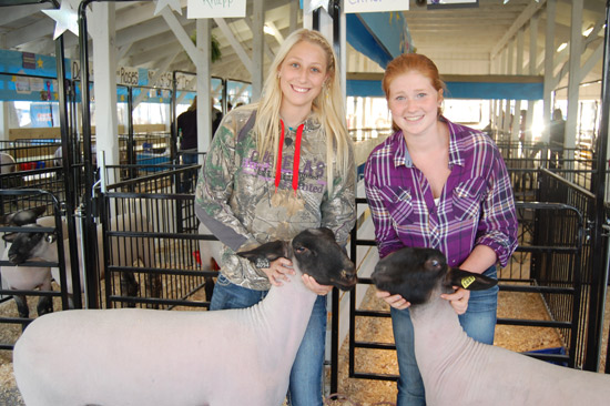 (from left) Michelle Knapp and Lauren Christensen, with their champion sheep.