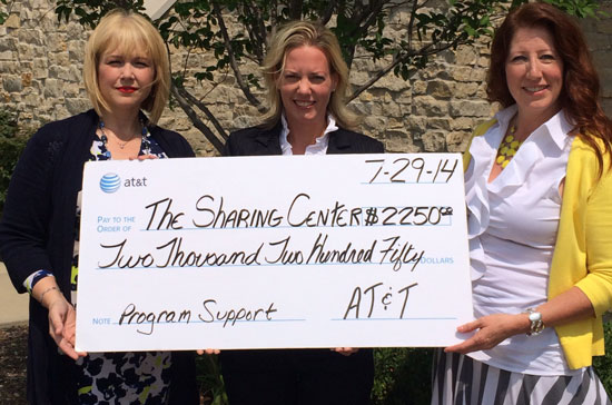 (From left) Tricia Conway of AT&T, State Rep. Samantha Kerkman, and Sharon Pomaville, Executive Director of The Sharing Center.