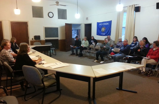 US Postal Service officials address the public at Randall Town Hall in Bassett on Tuesday.