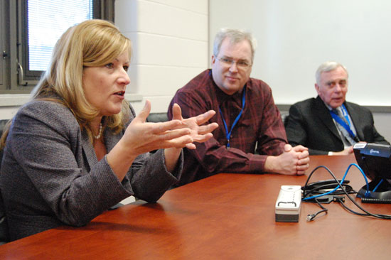 New Trevor-Wilmot Consolidated District administrator Michelle Garven (left) meets with reporters at the school Friday. In the center is school bord President Tom Steiner and current district administrator George Steffen at right.