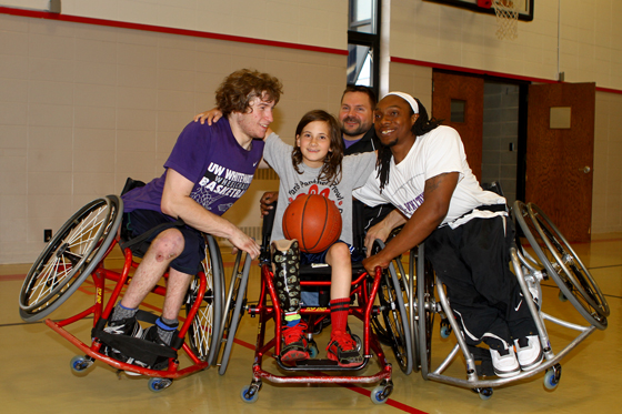 Jake Shafer, Dan Price, Derrick Dortsch from Whitewater wheelchair basketball, visit Belle Fox at Paris School. 