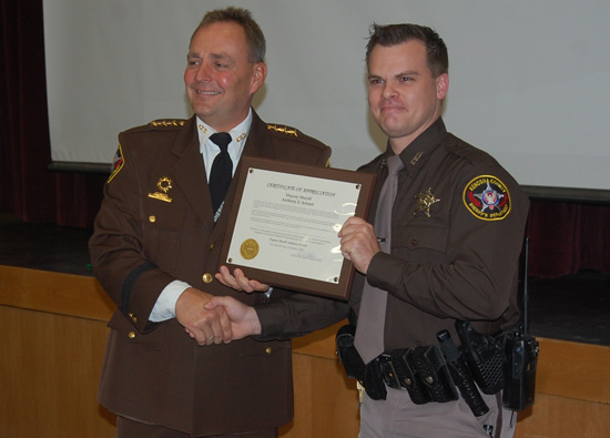 Sheriff David Beth and Deputy Anthony Schmit.