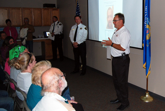 Kenosha County Sheriff David Beth addresses a community meeting Monday evening at the Kansasville Fire Department. to the left is Racine County Sheriff Christopher Schmaling.