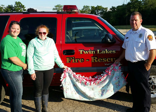 Lori Harpster General Leader, Cassidy Dabbs Youth Member who organizied the project and Tom Smith from Twin Lakes Rescue Squad.
