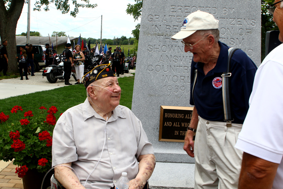 WWII veterans in front of the new monument, Walter Glas, Jr., 90 and Rueben Newholm, 92.